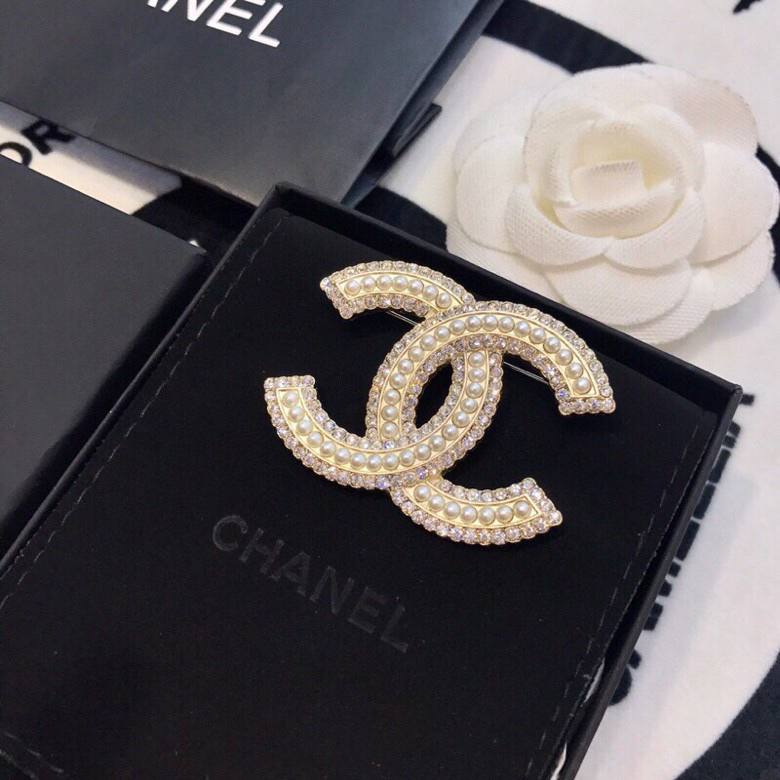Ch*el brooches